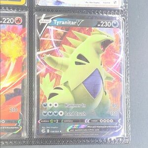 Pokemon Tyranitar V Trading Card - Green and Purple
